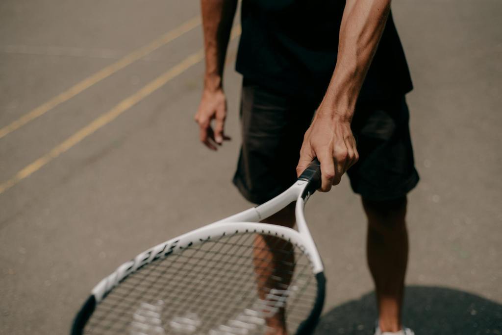 person holding a tennis racket